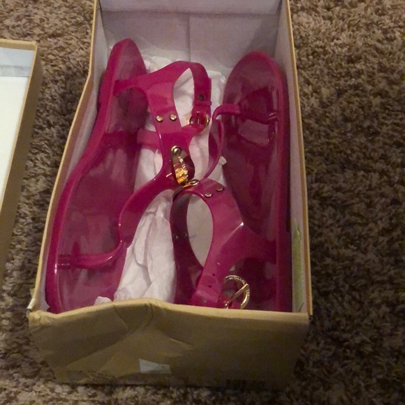 Michael Kors Shoes - Fuschia MK Plate Jelly Sandals